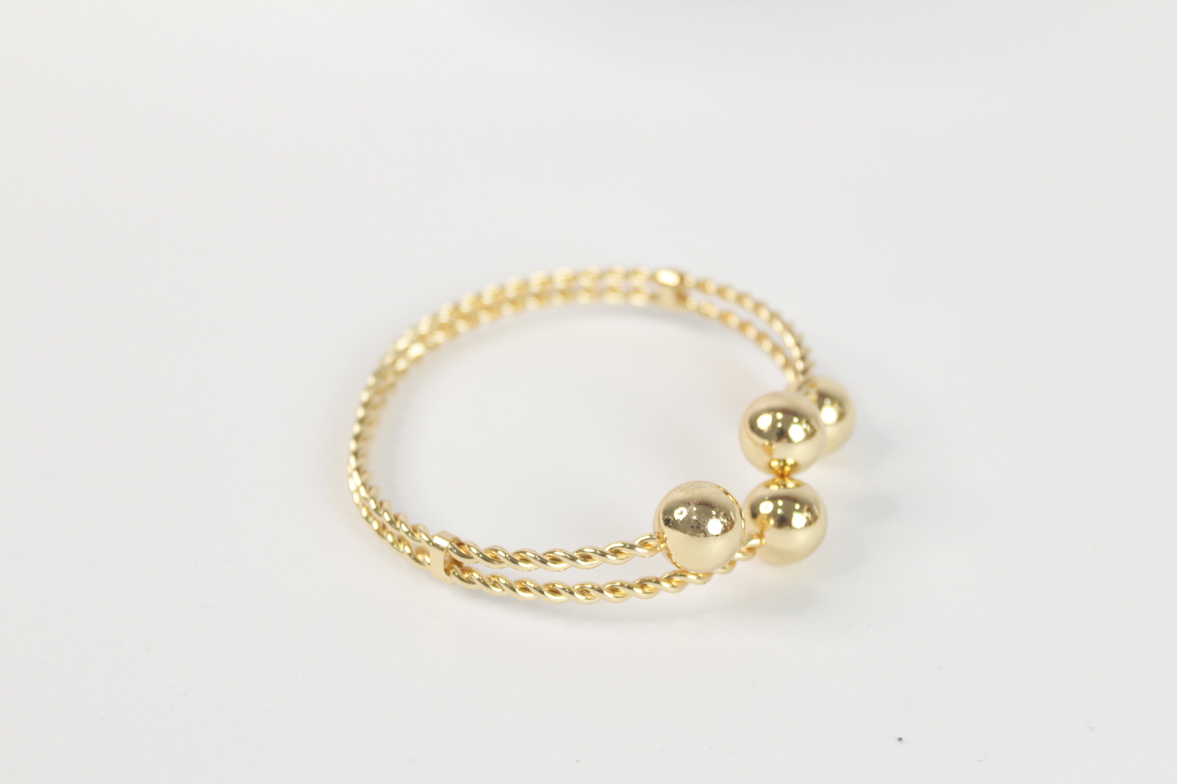 Brazalete "Orbital Twist"